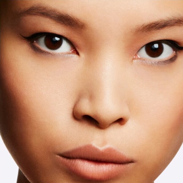 Model shot focusing on natural, radiant skincare